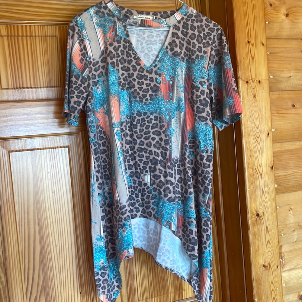 Super cute size large gently worn blouse leopard print with accents colors
